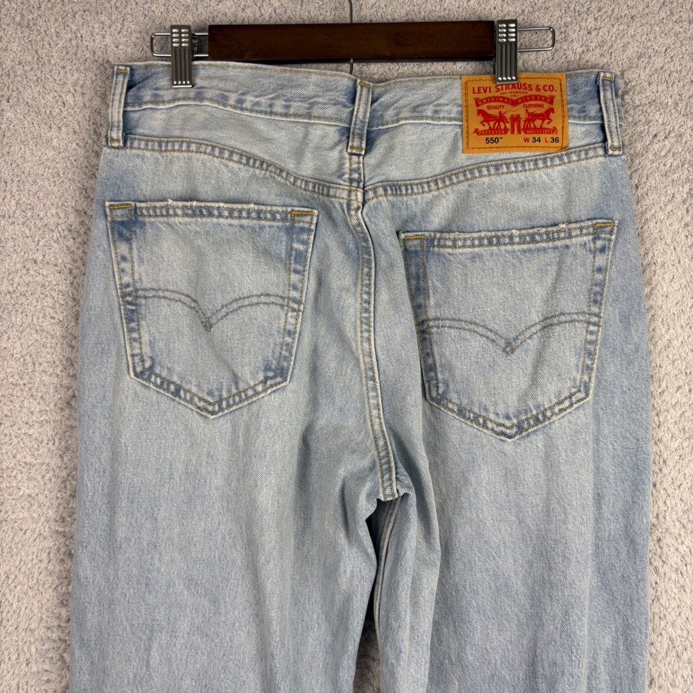 Levis Jeans Mens 34x36 Blue 550 Relaxed Fit Tapered Leg Light Wash Denim Faded - Picture 4 of 9